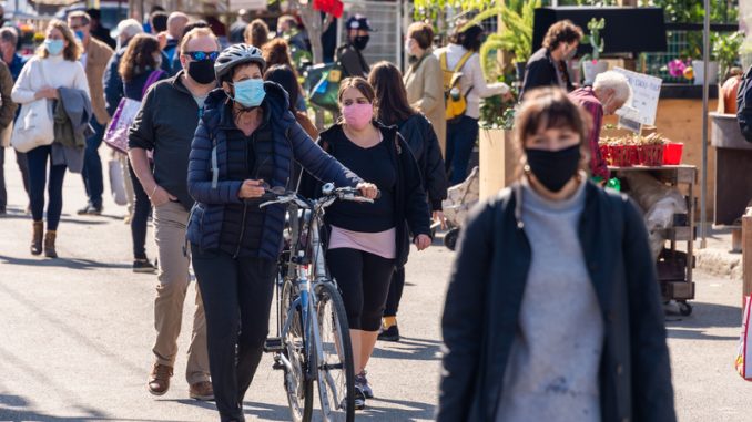 Many people wearing Coronavirus face masks