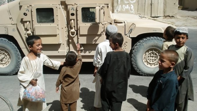 Group of seven children from Afghanistan asking for food from the US soldiers!